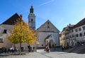 Tourists and locals in the square of Skofja loka, Slovenia Royalty Free Stock Photo