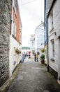 Beautiful buildings in Padstow, Cornwall, UK with people walking around