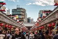 Tourists and locals walking in Senso-ji temple market street