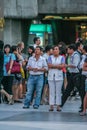 Tourists and locals watching the live broadcast on the screen on the street of wedding of Prince William and Kate Middleton. Royalty Free Stock Photo