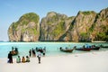 Tourists and longtail boats at Maya Bay on Phi Phi Leh Island, K