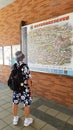 Tourists look at the map Attached to the wall Recommended places to visit in Taipei, Taiwan.