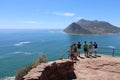 Tourists look out towards Hout Bay from the Chapman's Peak viewpoint Royalty Free Stock Photo