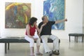 Tourists look at paintings by Marc Chagall, Marc Chagall Museum, Nice, France