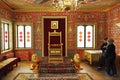 Tourists look at throne in Great Wooden Palace