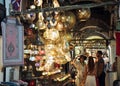 Tourists looking for crystal lamps in Grand Bazaar of Istanbul, Turkey