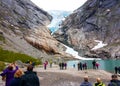 Tourists looking at glacier