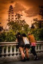 Tourists looking at London Eye