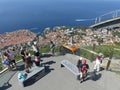 Tourists looking out over panorama view of old town Dubrovnik