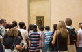 Tourists in Louvre Museum