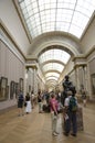 Tourists in Louvre Museum