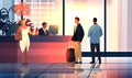 tourists with luggage departing from business trip standing at reception desk in hotel lobby recreation travel check-in Royalty Free Stock Photo