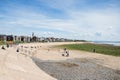 Tourists on the Lytham coast Royalty Free Stock Photo