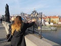 Tourists make their wishes in Prague