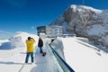 Tourists make travel photo at the terrace on top of the Pilatus mountain in Lucern, Switzerland.