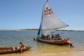 Tourists makeing a trip on a sailing boat at Barra de Cunhau on Brazil