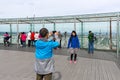 Tourists making pictures from Montparnasse tower in Paris, France