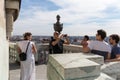 Tourists making shoot on the roof of St. Stephen's Cathedral in Budapest, Hungary. Royalty Free Stock Photo