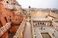 Tourists in maze of red and pink sandstone in Jaipur Royalty Free Stock Photo