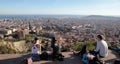 Tourists meet to watch Barcelona views from nearby hill