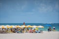 Tourists on Miami Beach. Getting ready for a day at the beach