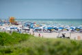 Tourists on Miami Beach. Getting ready for a day at the beach