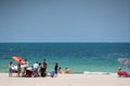 Tourists on Miami Beach. Getting ready for a day at the beach