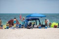 Tourists on Miami Beach. Getting ready for a day at the beach