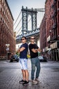 Tourists models enjoying New York City and Dumbo, Brooklyn Royalty Free Stock Photo