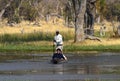 Tourists on a mokoro canoe in Botswana