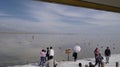 Tourists & monks visiting the China Caka salt lake