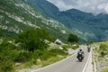 Tourists with motorbikes travel in the high mountain Royalty Free Stock Photo