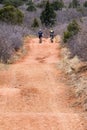 Tourists mountain biking in Colorado Red Rocks Open Space park