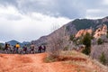 Tourists mountain biking in Colorado Red Rocks Open Space park