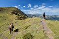 Tourists in the mountain passage in the Atlantic Pyrenees Royalty Free Stock Photo