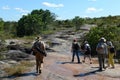 Tourists on a mountain river Canio Cristales.