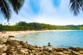 Tourists on the Nai Harn beach - one of the best beaches in Phuket Royalty Free Stock Photo