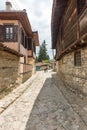 Tourists on the narrow streets of the old Koprivshtitsa in Bulgaria Royalty Free Stock Photo