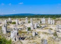 Tourists in the natural phenomenon Pobiti Kamani, Bulgaria