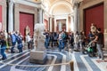 Tourists near ancient The Belvedere Torso statue