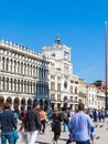 Tourists near Clock Tower on St Mark`s Square Royalty Free Stock Photo