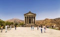 Tourists near the Garni Temple, a pagan temple in Armenia. Royalty Free Stock Photo