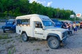 Tourists are near jeeps at parking and rest area during jeep safari excursion, Turkey Royalty Free Stock Photo