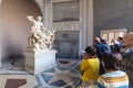 Tourists near Laocoon Group statue in Vatican Royalty Free Stock Photo