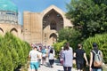 Tourists near the medieval Mausoleum of Khoja Ahmed Yasawi in the city of Turkestan