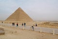 Tourists near Pyramid of Khafre on Giza plateau, Cairo, Egypt Royalty Free Stock Photo