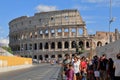 Tourists near roman Colosseum in Italy