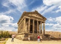 Tourists near the Temple of Garni - a pagan temple in Armenia was built in the first century Royalty Free Stock Photo