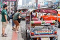 Tourists negotiating ride