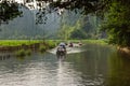 Tourists on the Ngo River at Trang An UNESCO World Heritage